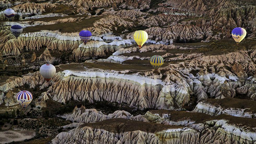 Hot air balloons fill the sky in Cappadocia, Turkey. (Afonso Salcedo)