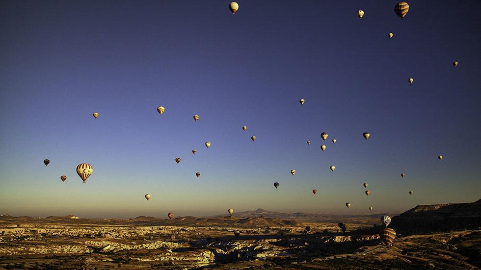 Hot air balloons fill the sky in Cappadocia, Turkey. (Afonso Salcedo)