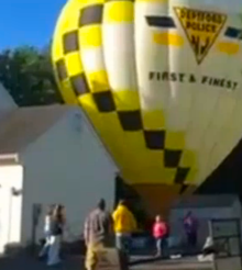 Police Drop In by Balloon